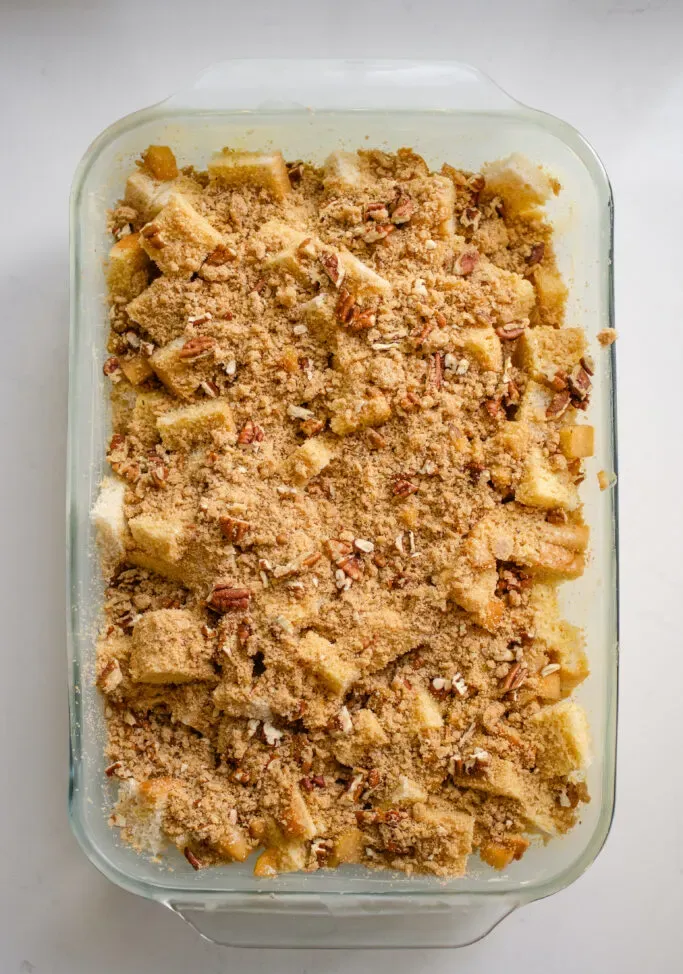 The pan of apple French toast casserole with the streusel on top.' title='Apple French Toast Casserole Recipe