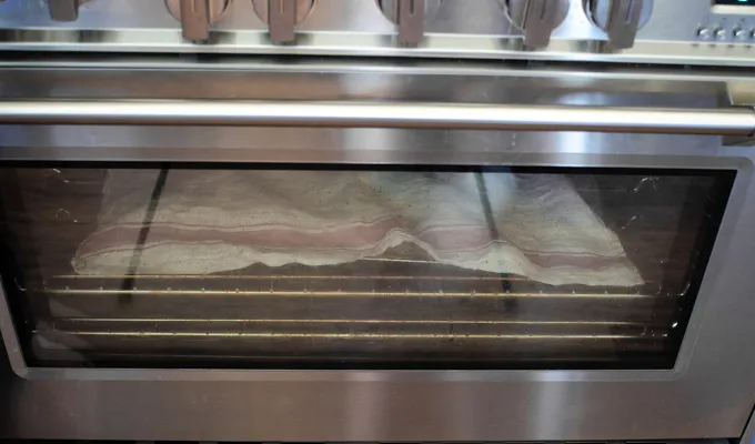 Using an oven for a proofing box for sourdough baking.' title='Sourdough English Muffins