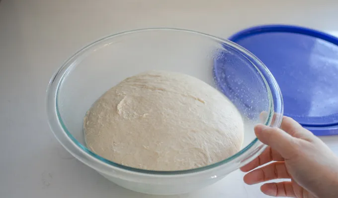 The risen sourdough English muffin dough.' title='Sourdough English Muffins