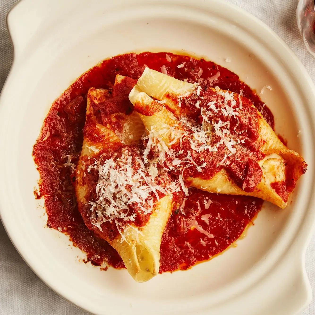 Image may contain Food Meal Dish Pasta and Ravioli