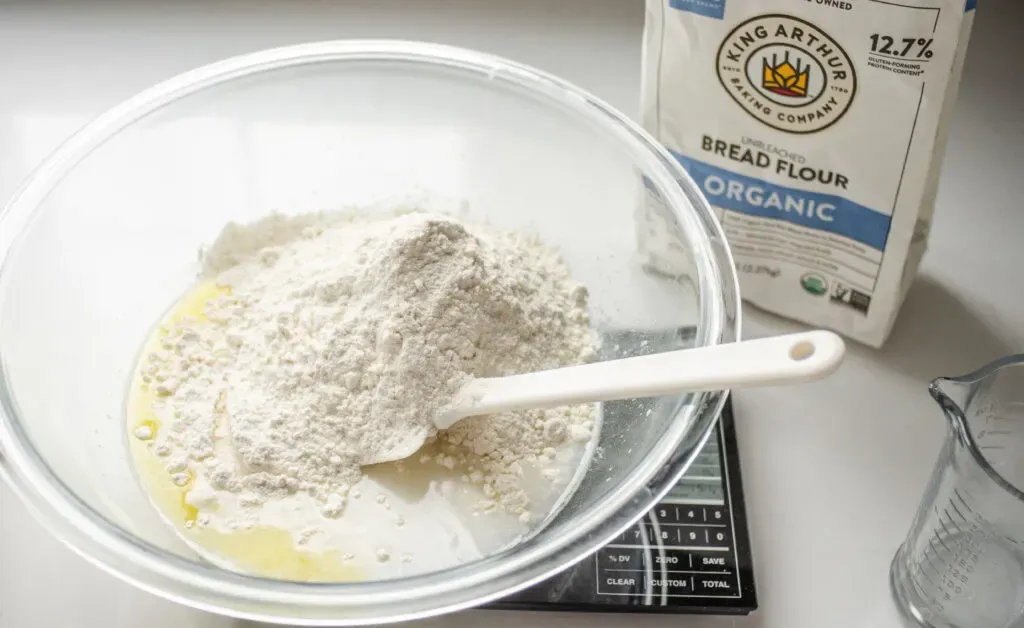 Adding the remaining ingredients except for the salt. ' title='Sourdough Pizza Crust Recipe