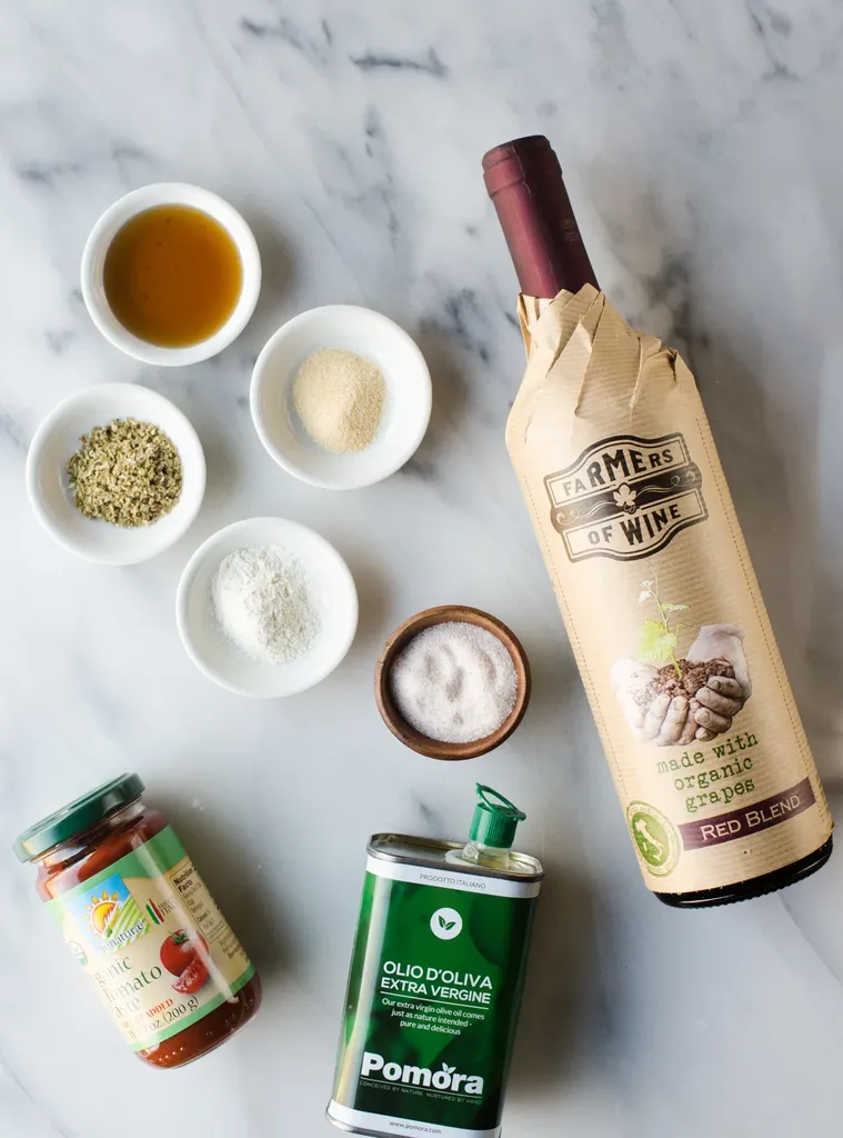 All of the ingredients needed for homemade pizza sauce from tomato paste.' title='Easy Homemade Pizza Sauce with Tomato Paste