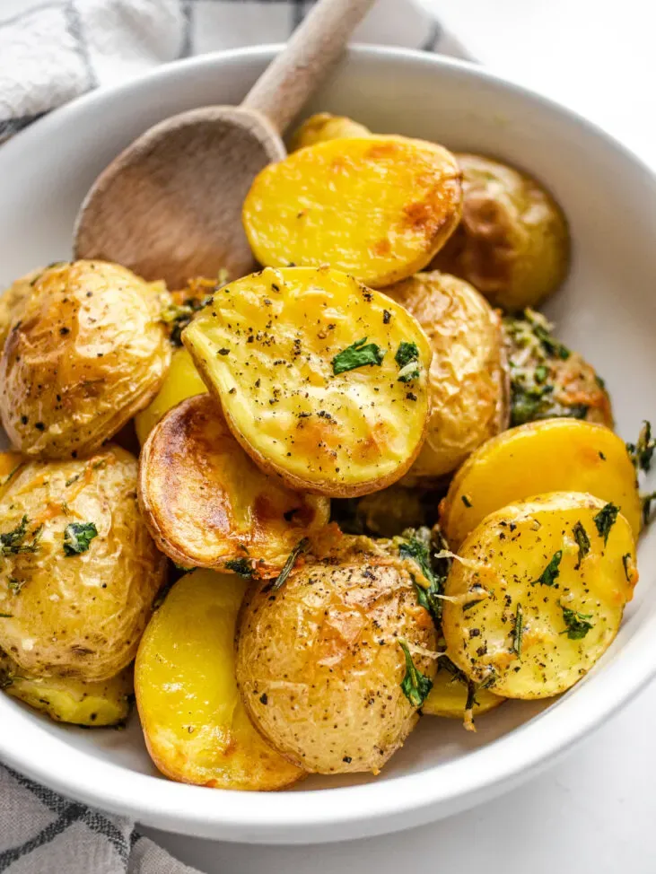 Elevated Roasted Little Potato recipe with fresh herbs lemon garlic and parmesan cheese.' title='Roasted Little Potato Recipe