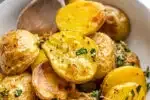 Elevated Roasted Little Potatoes with fresh herbs lemon garlic and parmesan cheese.' title='Roasted Little Potato Recipe