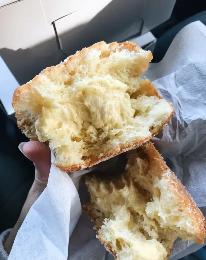 Bogart’s Doughnuts Minneapolis MN - vanilla buttercream filled doughnut' title='Fun Restaurants in Minneapolis