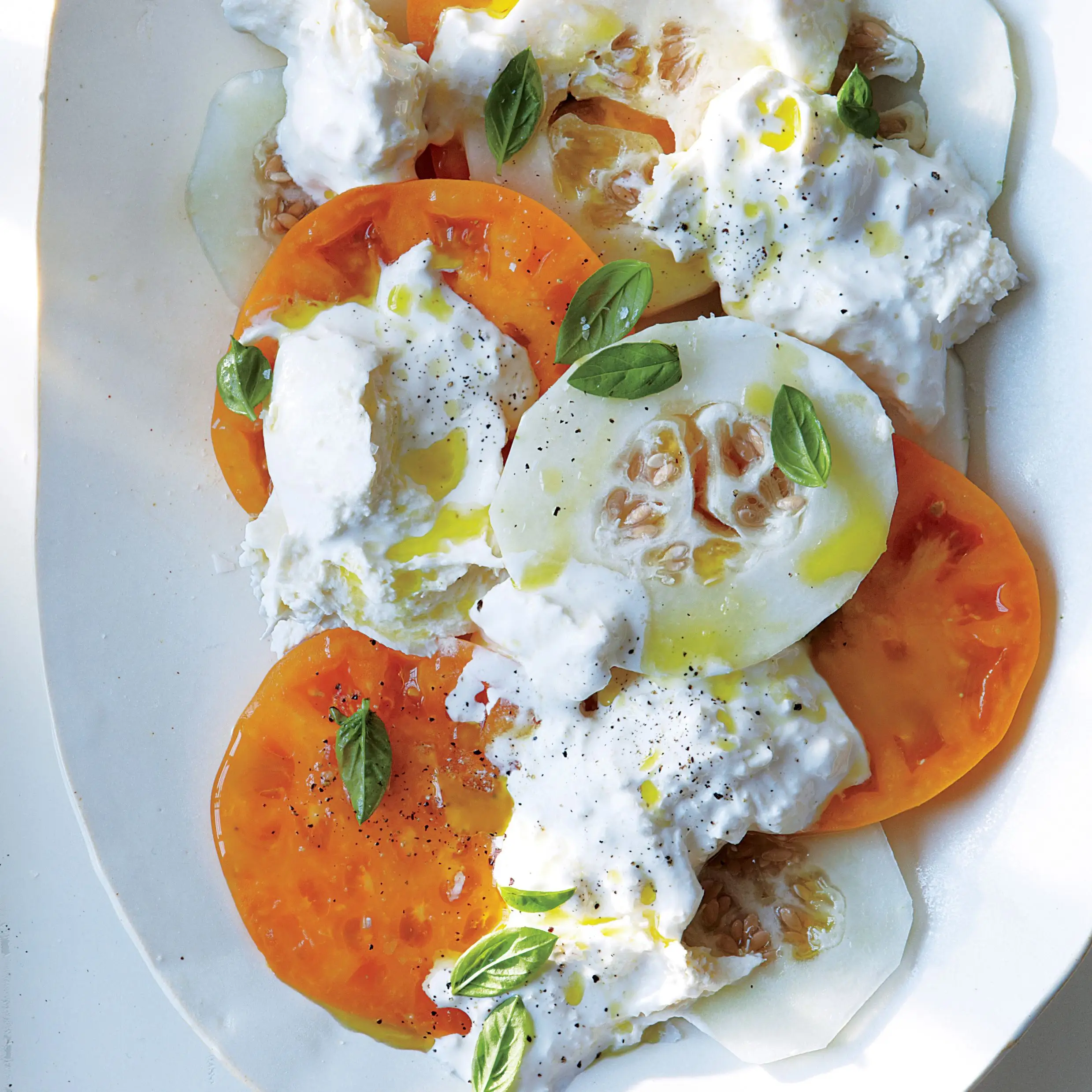 Tomate, melão em conserva e salada burrata