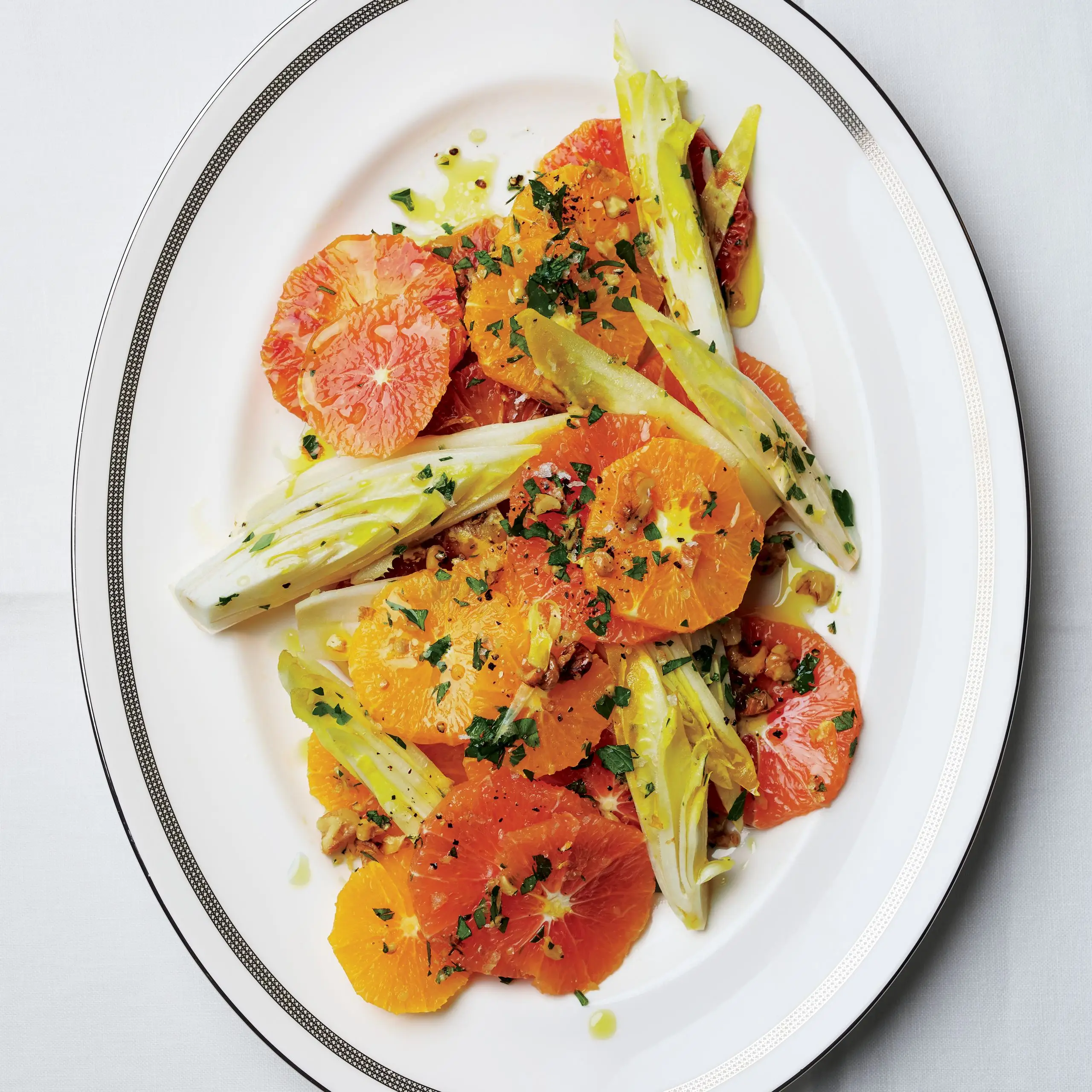 Citrus e endívia com Walnut Gremolata