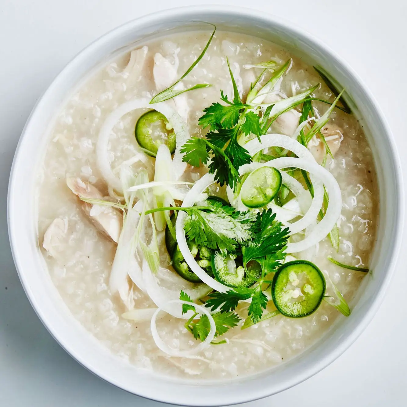 Sopa de galinha vietnamita com arroz