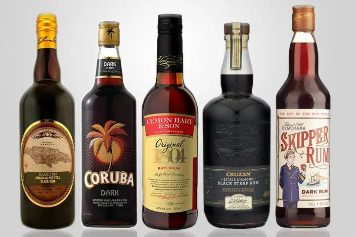 A lineup of black rums against a white background