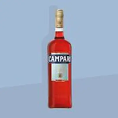 Bottle of Campari liqueur featured on blue background