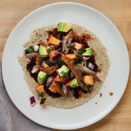 Taco de confit de perna de peru com Pasilla Purée e salsa de pêssego em conserva