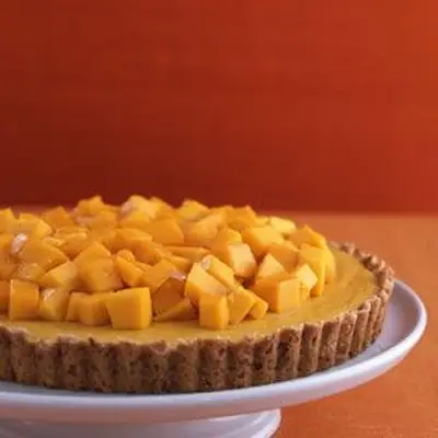 Torta de manga com crosta de coco